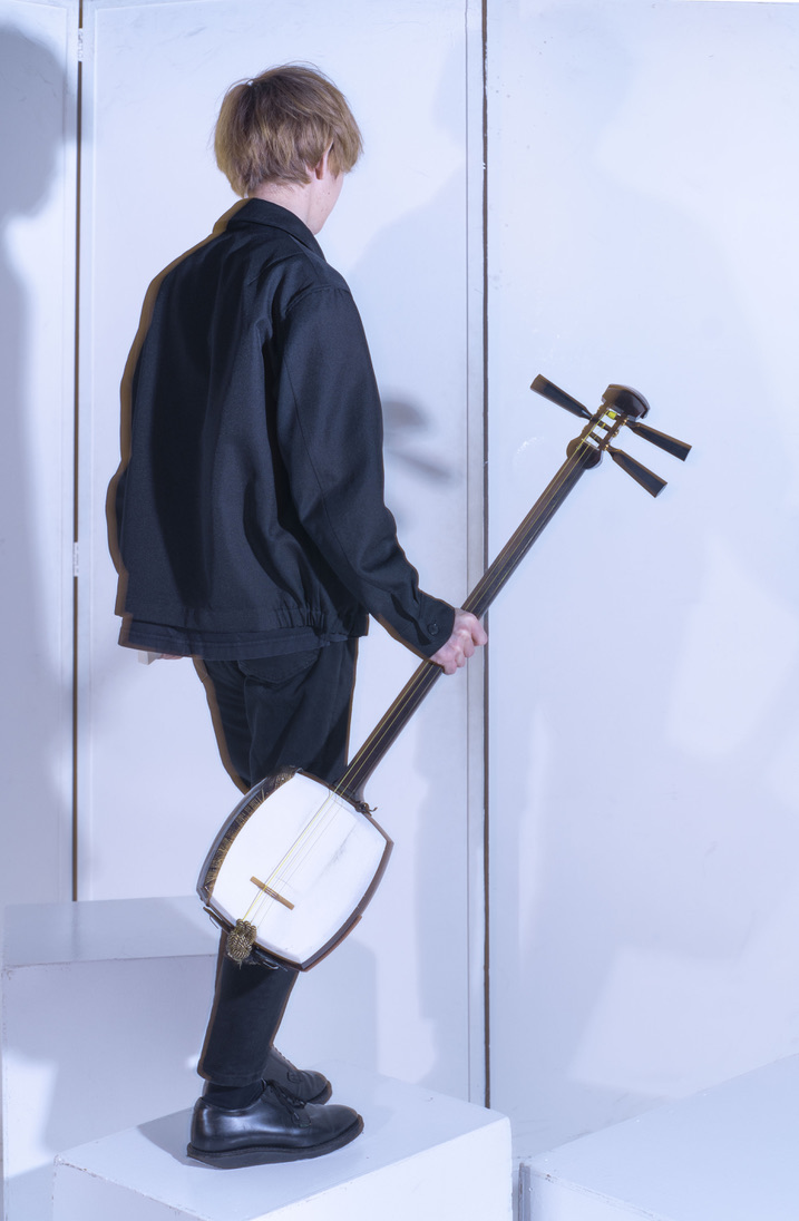 me holding the shamisen.